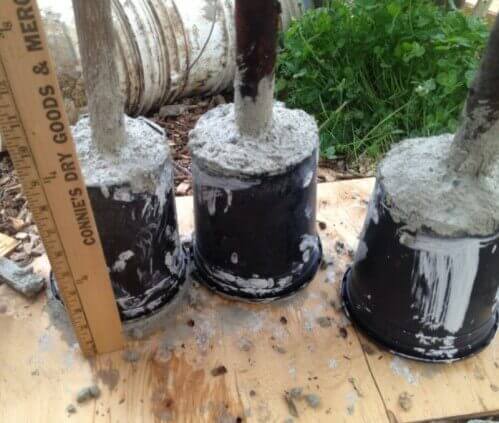 Plastic Pots Form the Mold for the Concrete Tampers