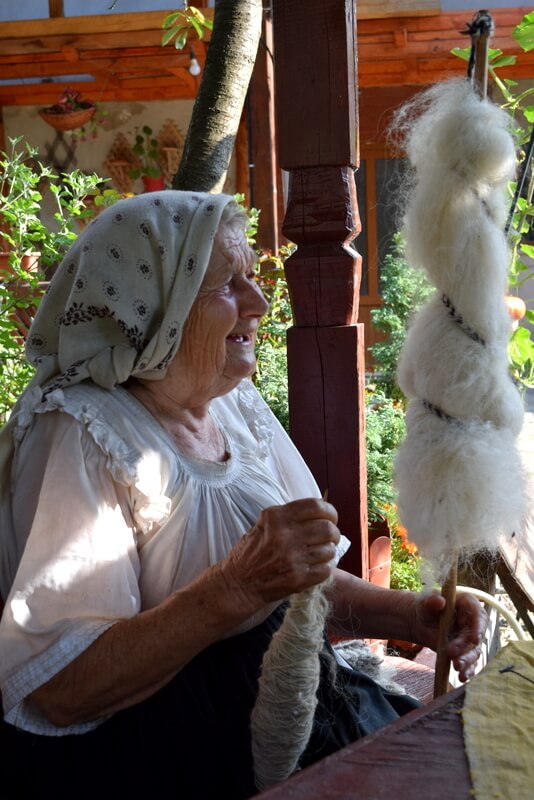 woman with wool spools