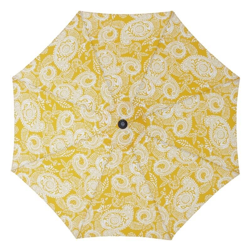 white and yellow paisley umbrella